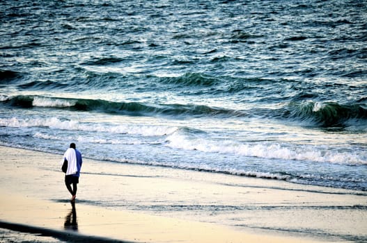 Man walking on the beach