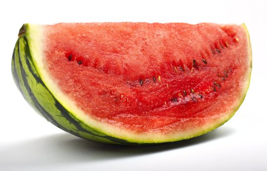 A slice of Watermelon over a white background.