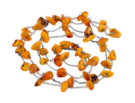 necklace collar made of baltic gold amber stone isolated on white background.