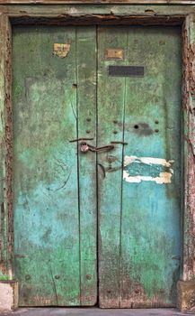 Old dilapidated wooden door. Rajasthan, India