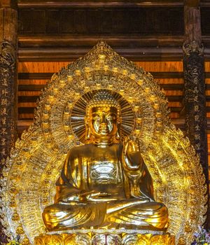 Framed giant golden image greets visitors.