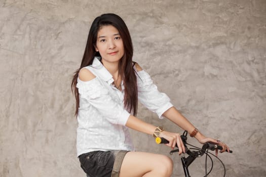 young woman with bicycle