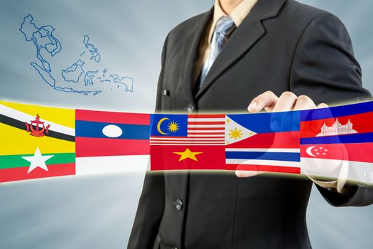ASEAN Economic Community in businessman hand