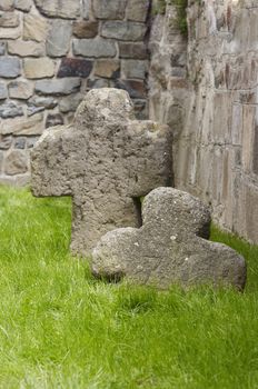 Old medieval tomb and stone cross