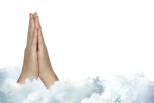 Praying woman hands with mystic holly clouds 