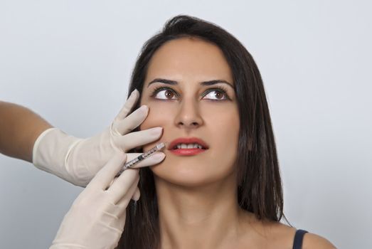 Cosmetic botox injection in the female face