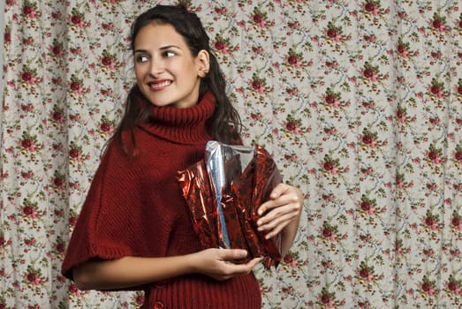 Woman in red over colorful floral background