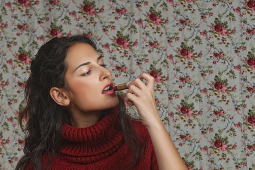 Woman with lipstick with floral background
