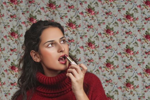 Woman with lipstick with floral background