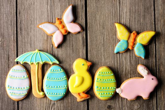 Easter homemade gingerbread cookie over wooden table