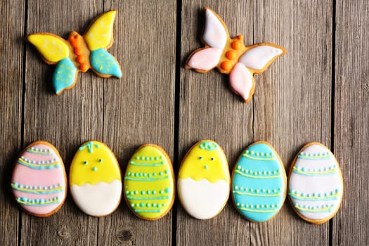 Easter homemade gingerbread cookie over wooden table