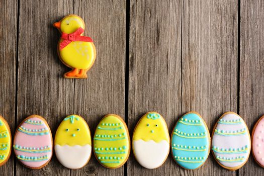 Easter homemade gingerbread cookie over wooden table