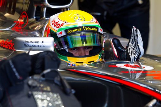 JEREZ DE LA FRONTERA, SPAIN - FEB 10: Lewis Hamilton of McLaren F1 waiting on the pit on training session on February 10 , 2012, in Jerez de la Frontera , Spain