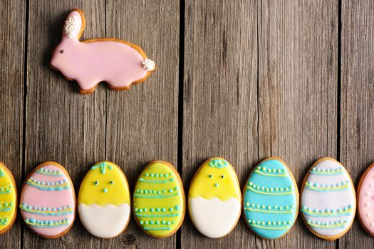 Easter homemade gingerbread cookie over wooden table