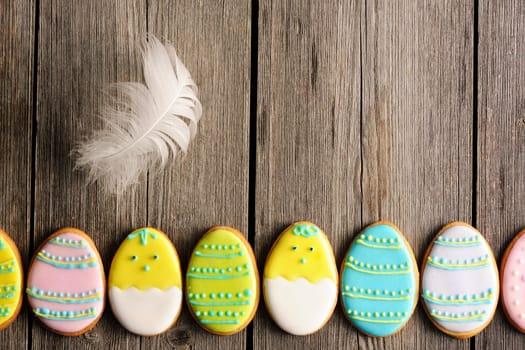 Easter homemade gingerbread cookie over wooden table