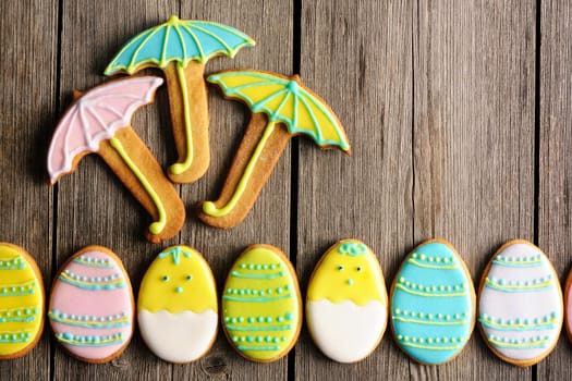 Easter homemade gingerbread cookie over wooden table