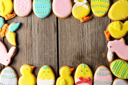 Easter homemade gingerbread cookie over wooden table