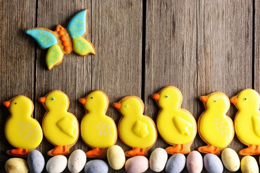 Easter homemade gingerbread cookie over wooden table
