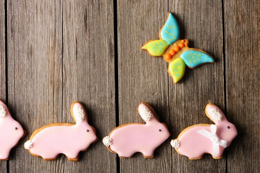 Easter homemade gingerbread cookie over wooden table