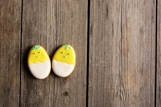 Easter homemade gingerbread cookie over wooden table