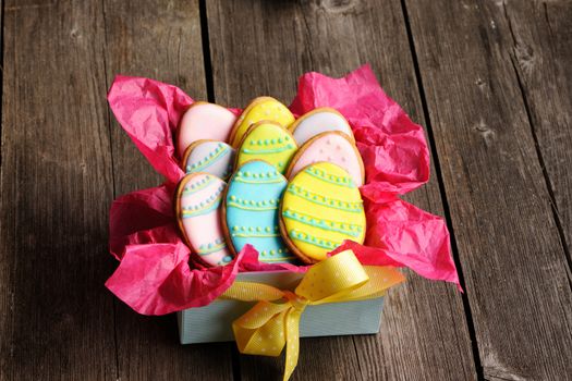 Easter homemade gingerbread cookie over wooden table
