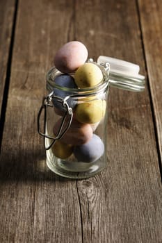 Colored easter eggs on table