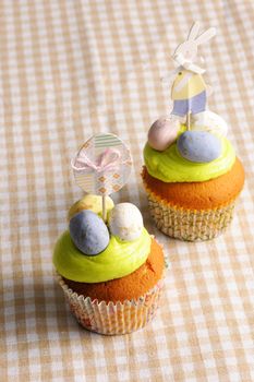 Easter homemade cupcakes on table