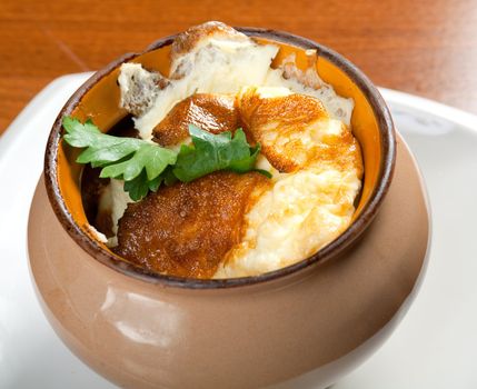 Omelette with cheese ceramic pot
