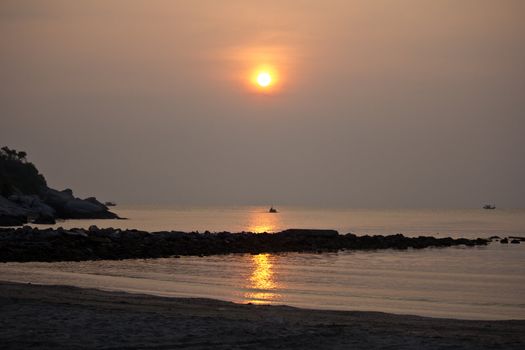 Hua Hin sun rise with reflection