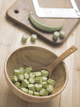 close up of a bowl of cut okra