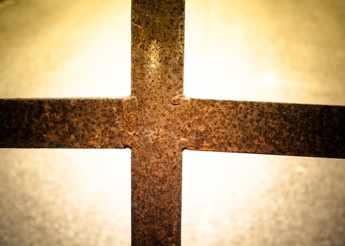 rusty metal cross