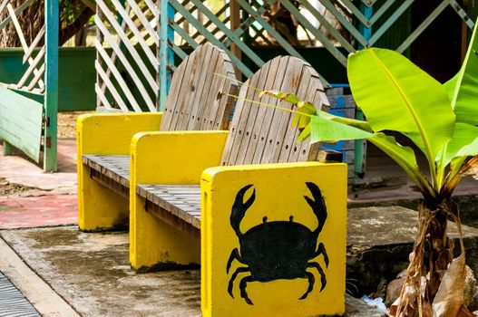 Outdoor bench with crab painted on it in San Andres y Providencia, Colombia