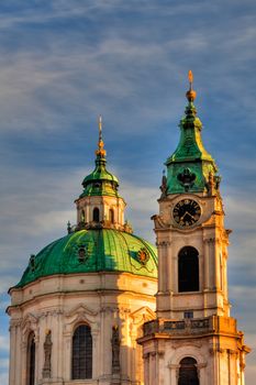 Famous St Nicholas church in Prague at sunrise