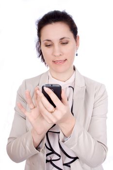 Beautiful brunette dials a number on your mobile phone