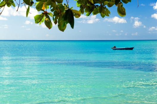 Blue boat and horizon of Caribbean Sea in San Andres y Providencia, Colombia