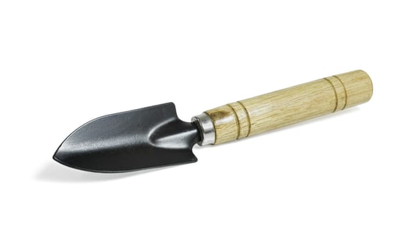 Steel shovel with a wooden handle on white background with clipping path
