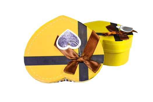 Yellow Heart-shaped box in heart shape on white background