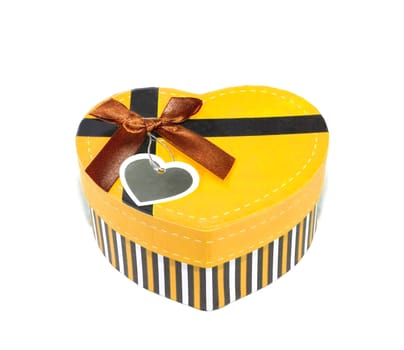 Yellow Heart-shaped box in heart shape on white background