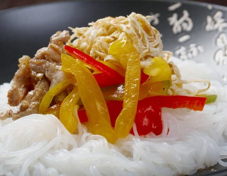 Chinese rice noodles with pork