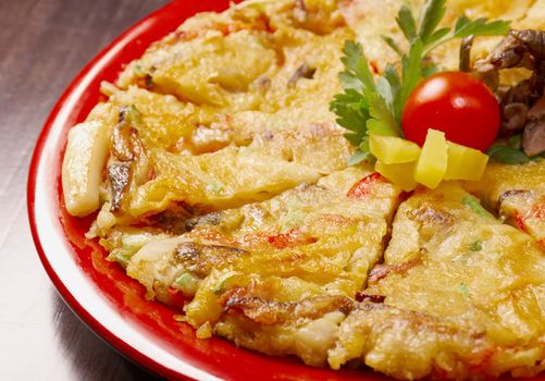 Japanese food close-up Okonomiyaki.(Japanese pizza)