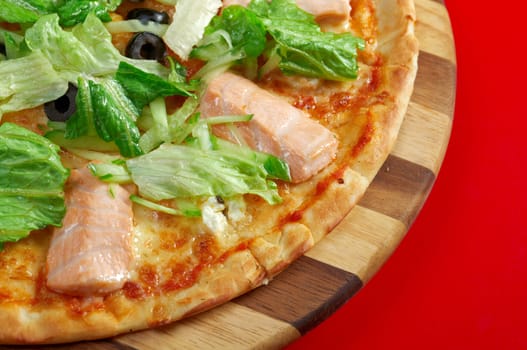 Pizza Atlantic salmon . italian kitchen. Studio