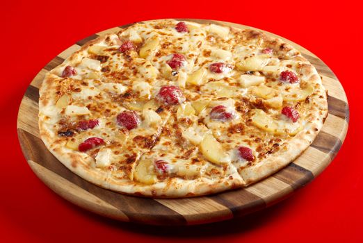 Pizzasweet with strawberries. italian kitchen. Studio