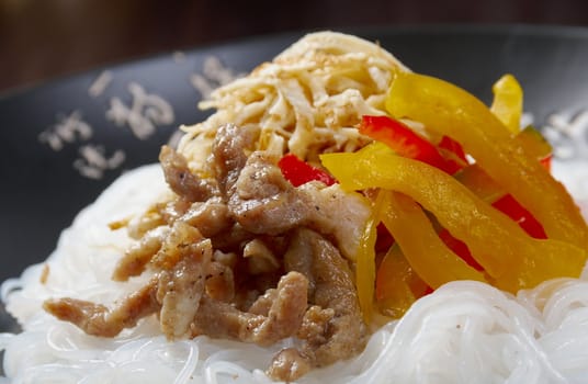 Chinese rice noodles with pork