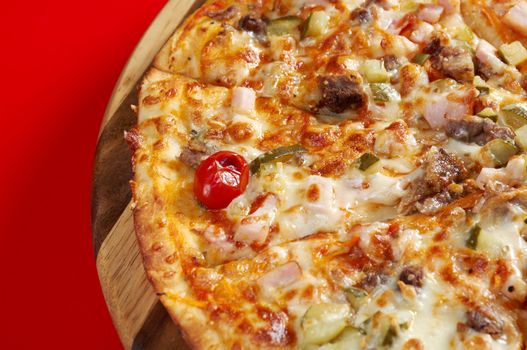 Pizza east with tomato. italian kitchen. Studio