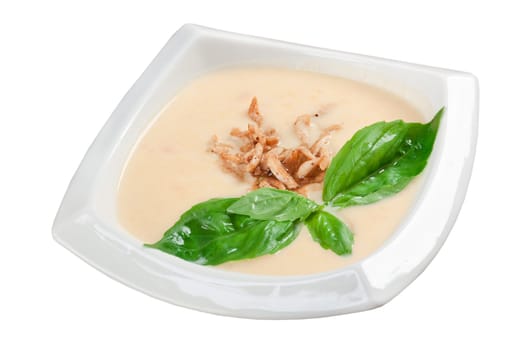 Italian cuisine.vegetable cream soup with smoked meat 