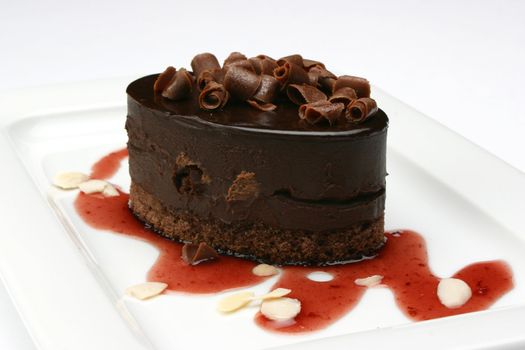 chocolate sweet cake with strawberry syrup