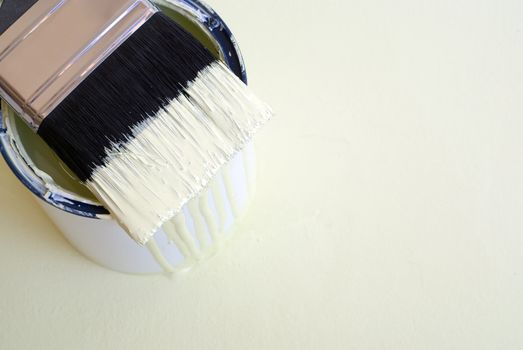 DIY home improvement paint brush on bucket or tin with copy space
