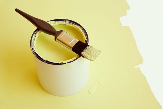 Home improvement paint brush on paint tin