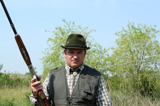 hunter with shotgun portrait