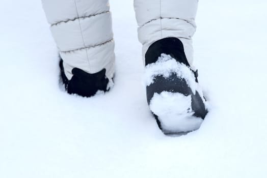snowboots in the winter snow